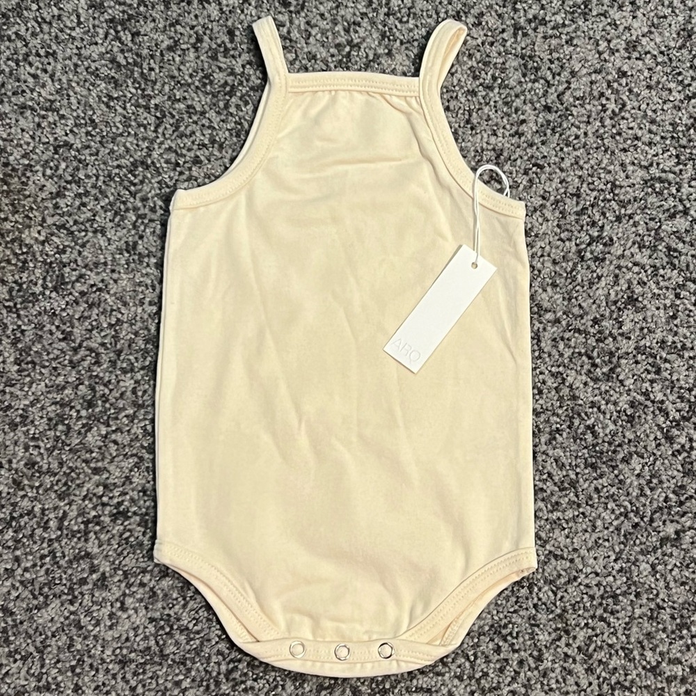 ARQ Baby Cream Bodysuit Size 18-24 Months NWT